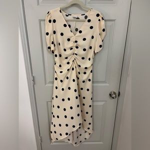 Elegant Polka Dot Dress in Cream and Black